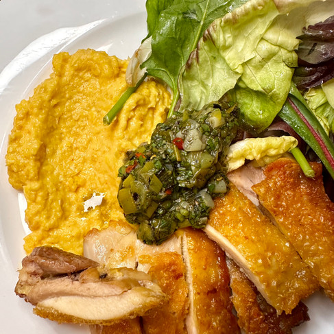 chicken thigh recipe: crispy chicken with corn puree and burnt onion chimichurri