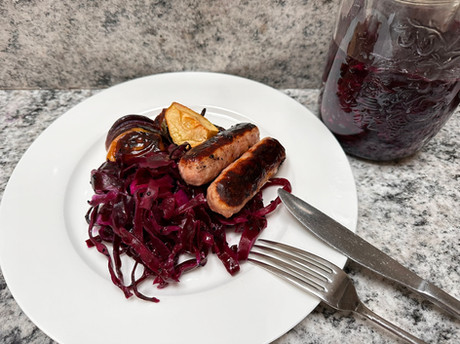 red cabbage sauerkraut with roasted apples, onion and sausages