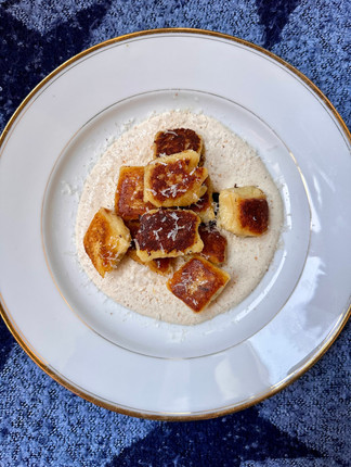 parsnip gnocchi with walnut sauce top view