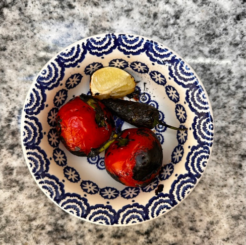 charred tomatoes, chilli and lime