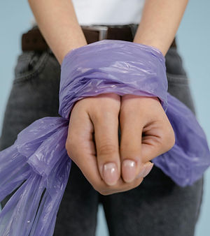 Hands bound by plastic