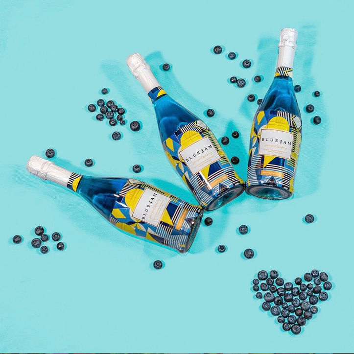 studio-zak-packaging-design- blue - jam - red - jam - sparkling - wine