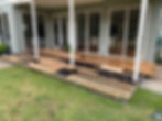 Wooden deck construction in Brighton showing timber planks.