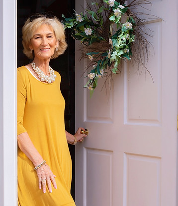 Meet Kim - Kim at her front door.jpg