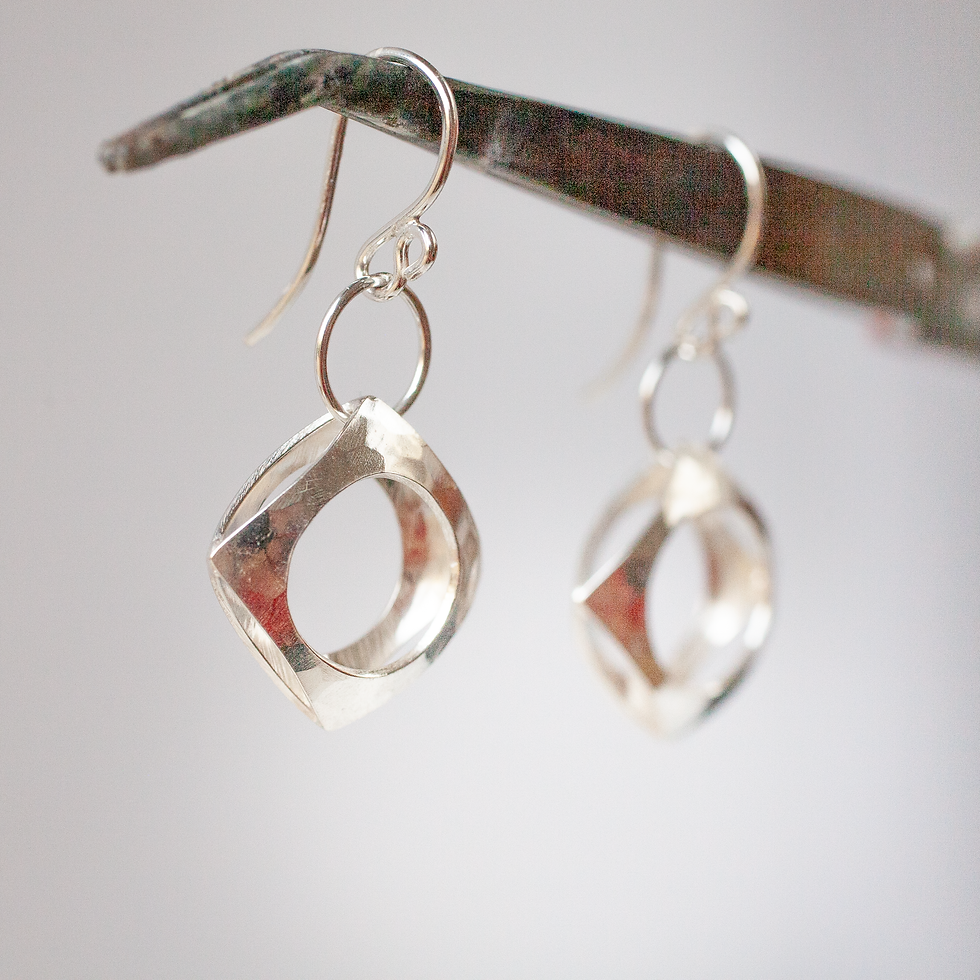 Thumbnail: Hammered diamond shaped silver earrings handmade