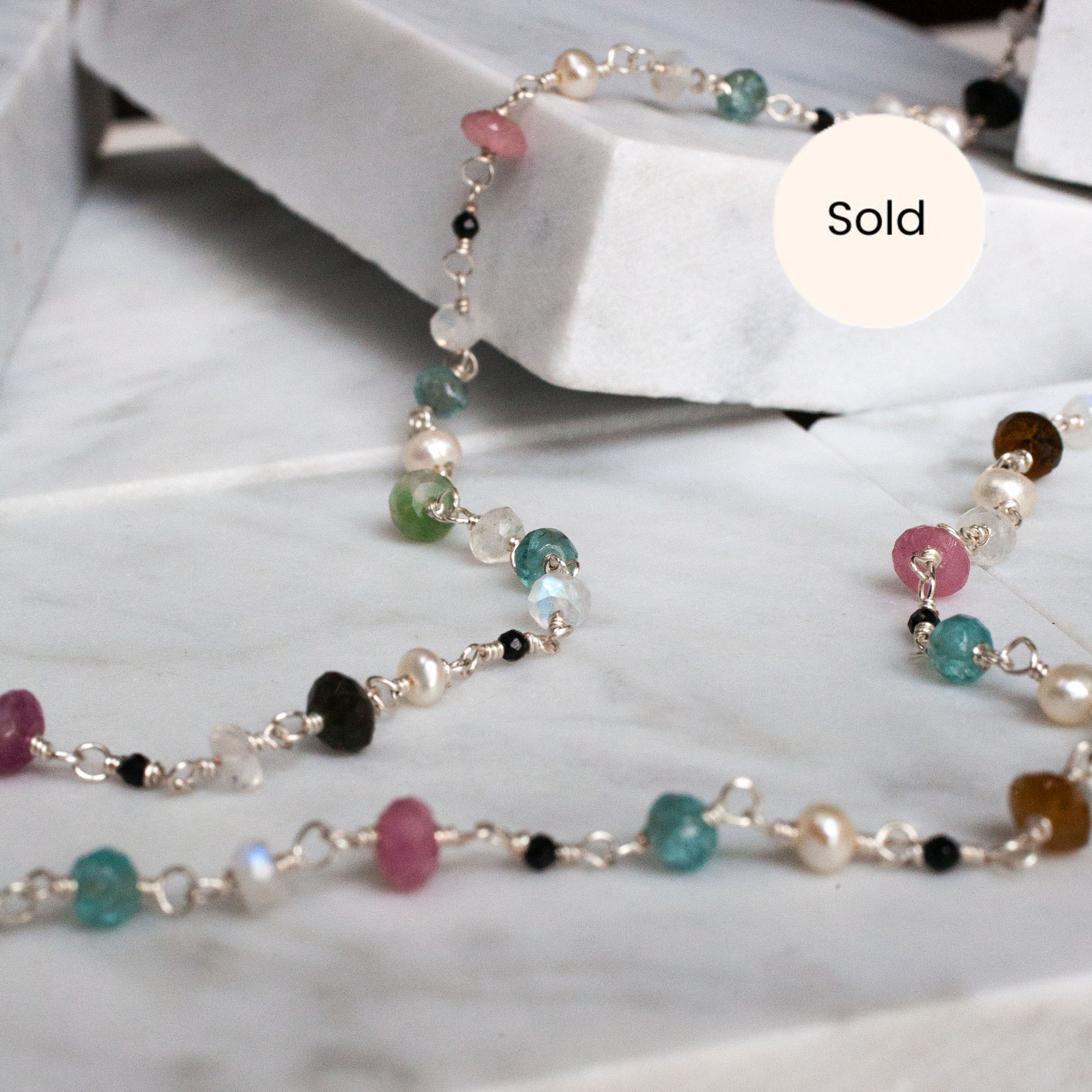 Handcrafted silver necklace with gemstones and pearls