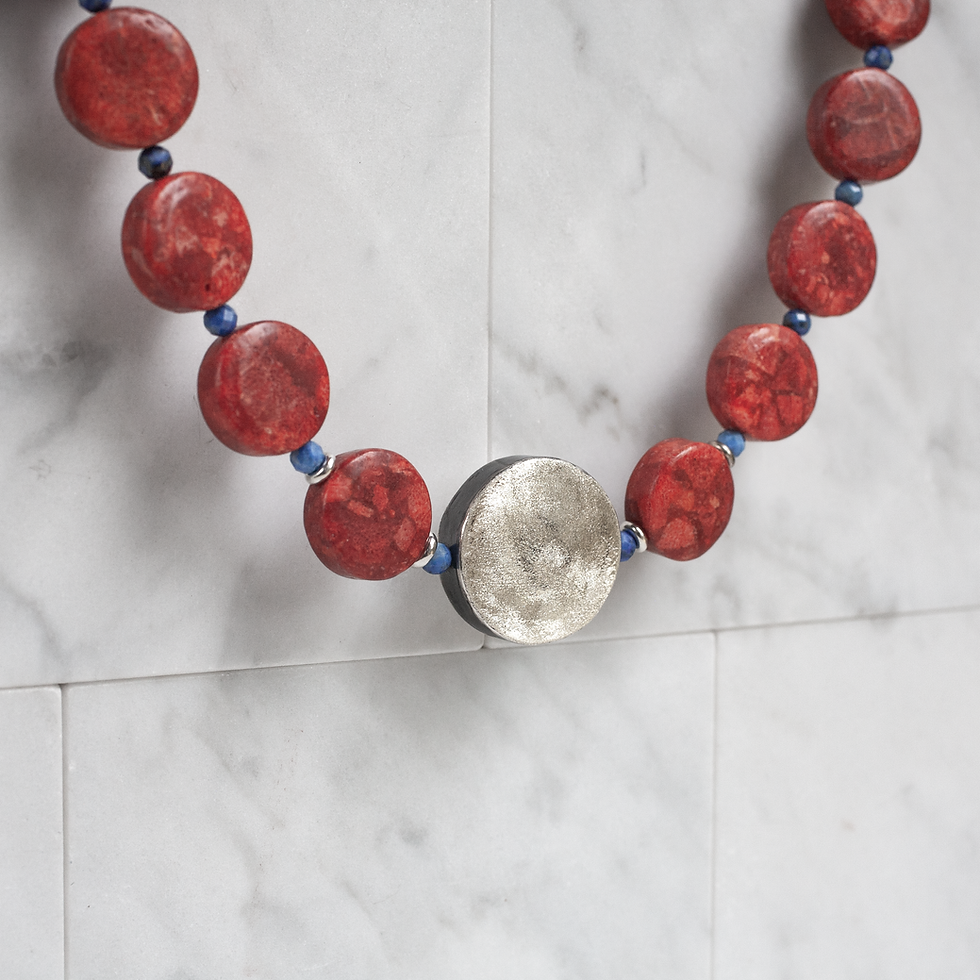 Frosted round disk centrepiece in red coral necklace