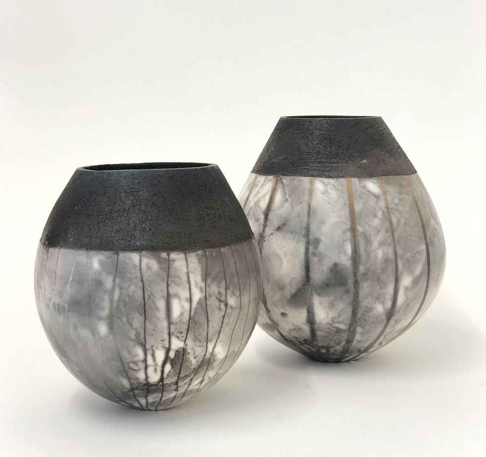Two ceramic vessels by Hannah Wilson.