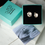 Thumbnail: Organic shaped silver studs in gift box with flyer