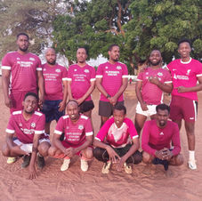 A team in East Africa in donated maroon kits, shared through our partner in Kenya (2023).