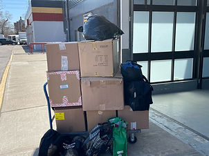 Donated soccer gear on a trolley at the Storage-Mart drop-off.