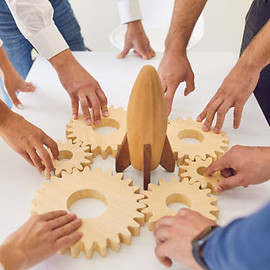 hands building together
