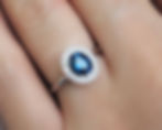 Thumbnail: Oval Blue Sapphire Engagement Ring with Diamond Halo