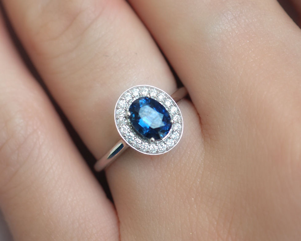 Thumbnail: Oval Blue Sapphire Engagement Ring with Diamond Halo