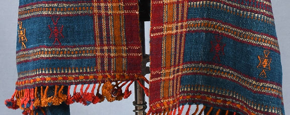 Intricate geometric motifs like Chaumukh and Satkhani woven into a vibrant, naturally-dyed Kachchh shawl border.