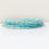 Thumbnail: stack of seed bead bracelets in turquoise, front view