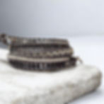 black agate, gray and silver 5 leather wrap bracelet on concrete