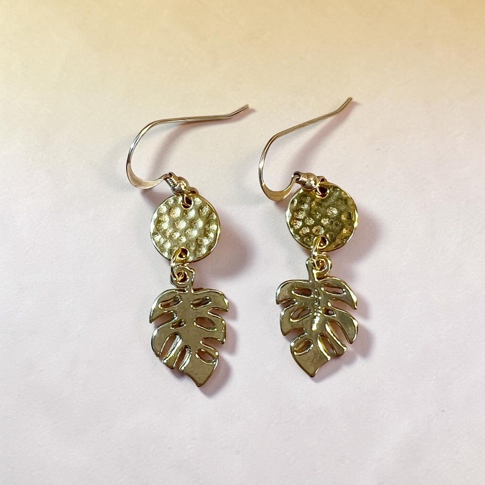 Thumbnail: gold leaf drop earrings overhead view