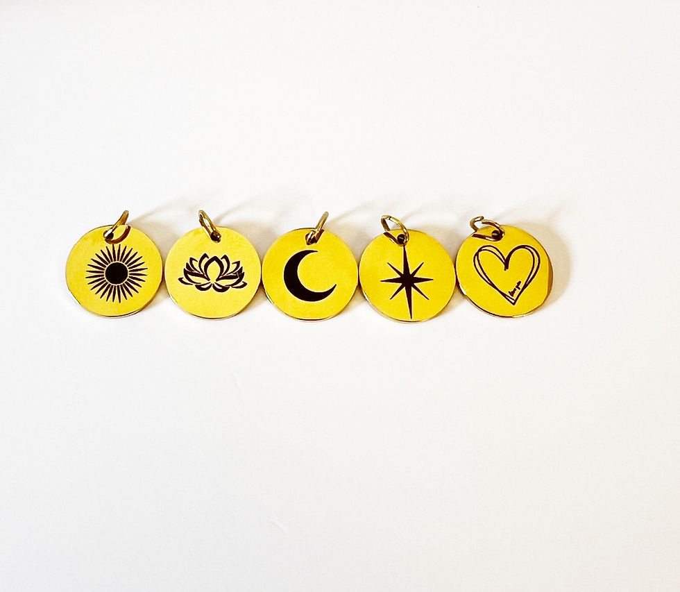gold symbol charms overhead view