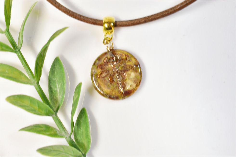 Thumbnail: dragonfly glass bead necklace on leather cord overhead view