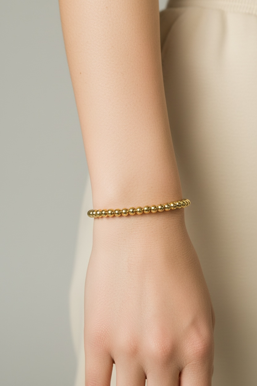 gold fill beaded bracelet on wrist