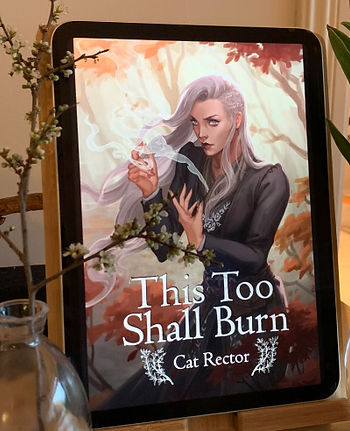 Ebook cover of This Too Shall Burn. Illustration of white-haired woman standing in an autumn forest kindling a flame between her fingers.