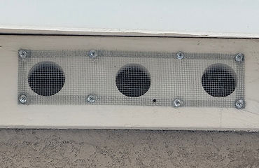 double zinc coated ember-resistant vent screens close up