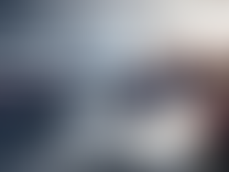 Eye-level view of a modern school computer lab with educational software on screens