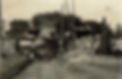 Trolley tracks being laid under a railroad bridge near eel pond Mattapoisett
