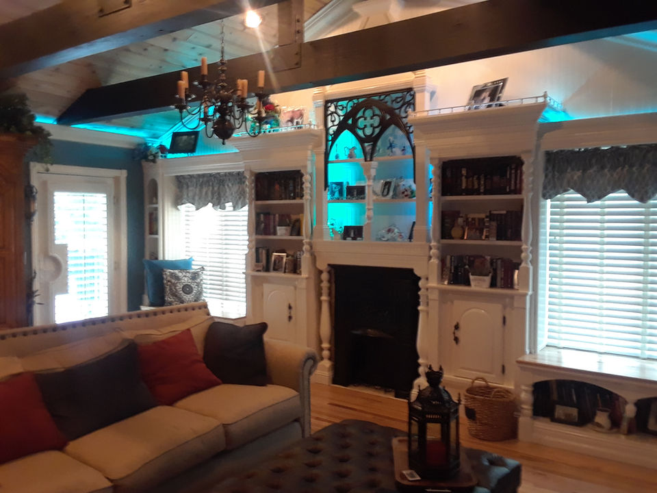 Inviting family room by Mackintosh Drafting featuring open-concept layout, warm textures, and versatile furnishings.