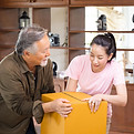 vecteezy_moving-day-concepts-asian-family-carrying-boxes-into-new_6773820_645.jpg
