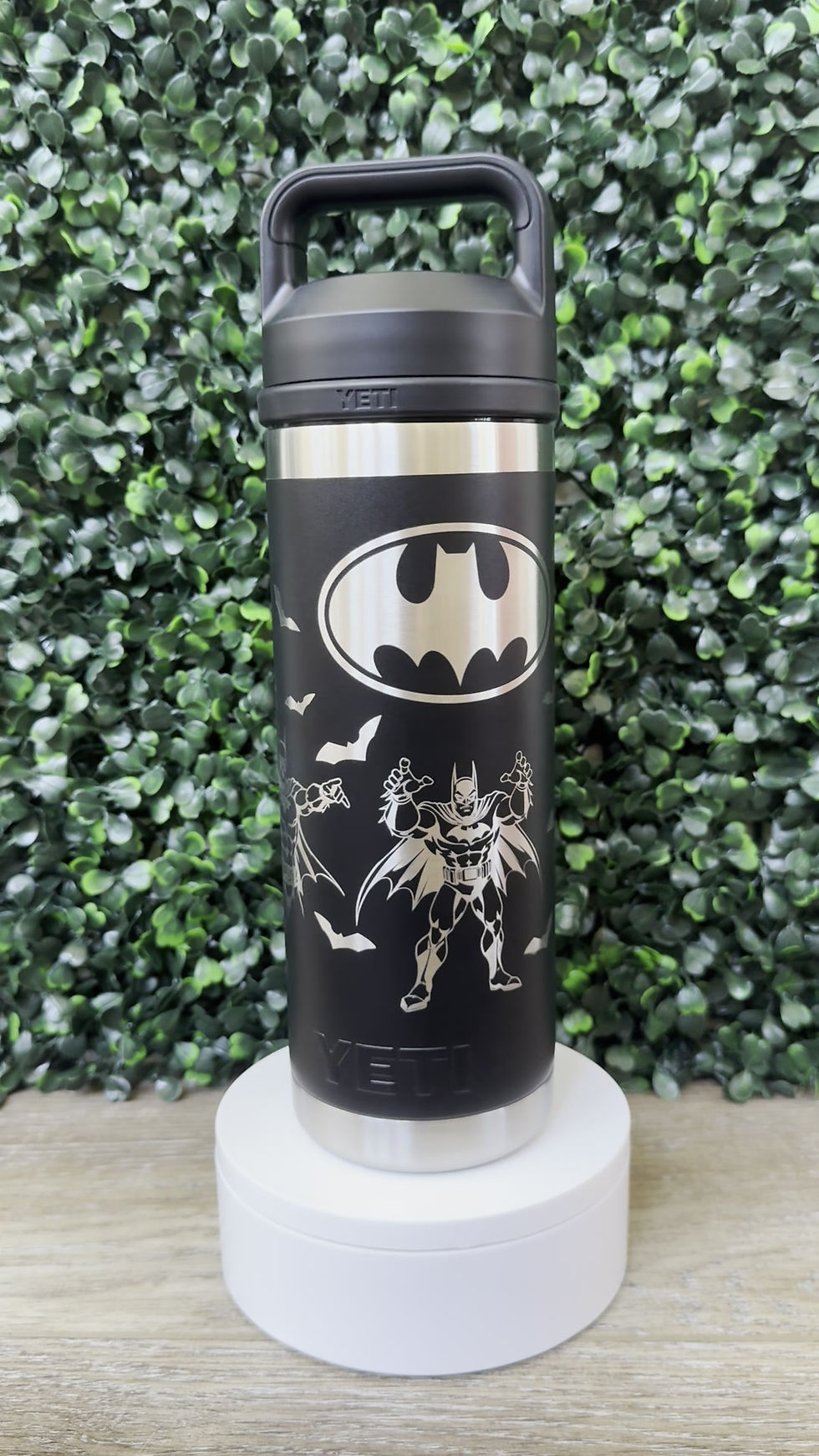 360° video of a YETI Rambler in Black Chug Lid with a laser-engraved Batman design spinning to show the full detail