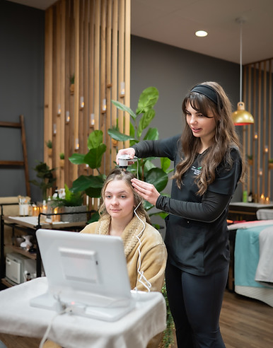 Guest enjoying a relaxing Japanese head spa treatment at The Hideaway