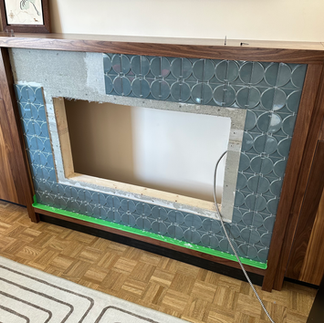 Fireplace tile installation progress
