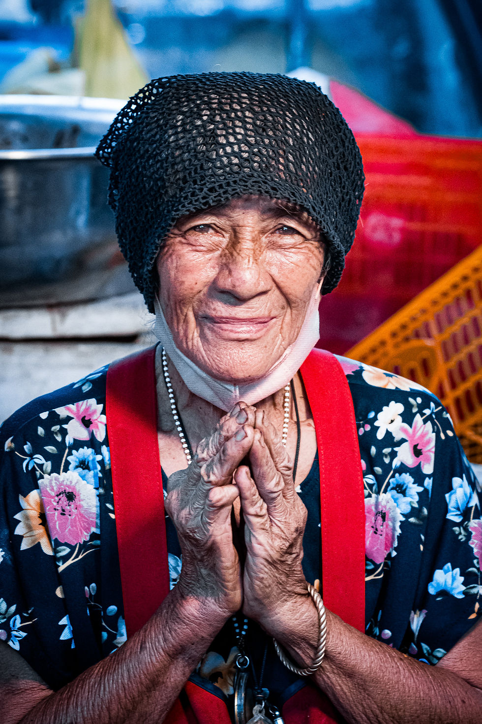 She greeted me with a wai and a smile that felt like home. Her hands told stories, her eyes carried kindness. At the heart of every festival are people like her.
