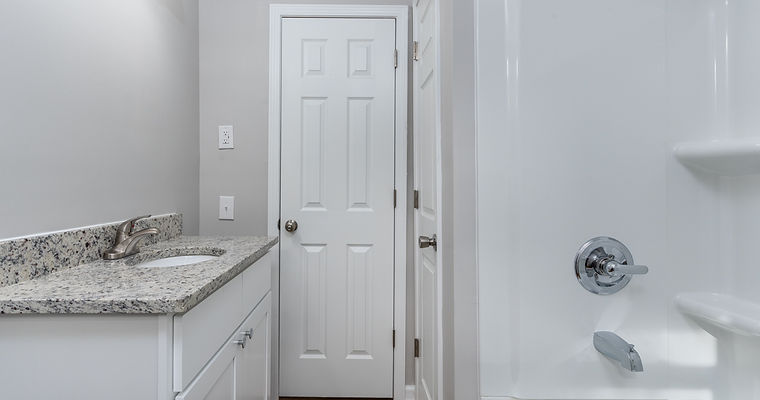 Beautiful bathroom remodel with granite countertops