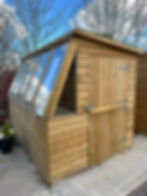 Wooden 16mm tanalised potting shed with built in work bench,