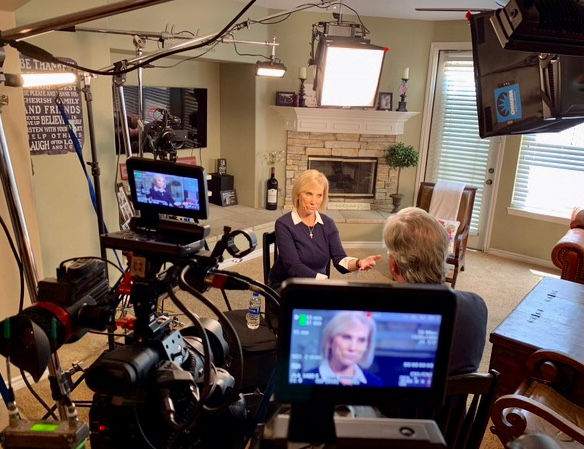 Kimberly King being interviewed on camera during a TV production