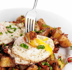 Forkful-of-vegetable-hash-breakfast-skillet.jpg