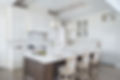 Painted-White-Kitchen-with-Dark-Wood-Isl
