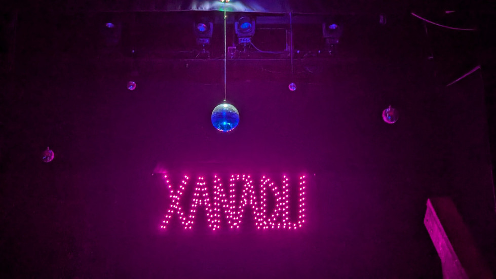 Xanadu Neon Sign and Mirror Balls