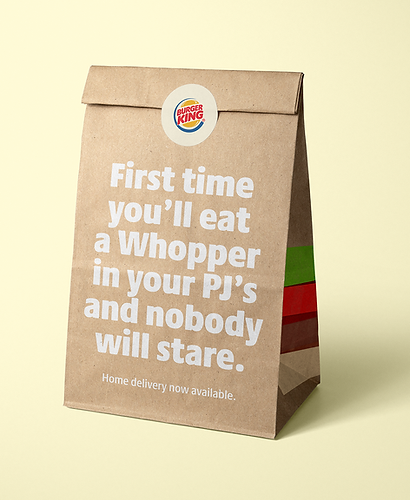 Paper bag that says First time you'll eat a whopper in your PJ's and nobody will stare