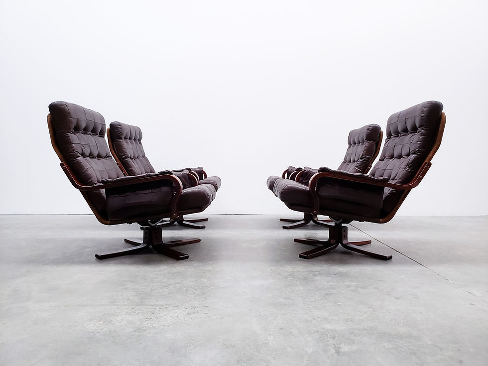 Mid Century Danish Swivel by K.N. Furniture in Brown Leather loftme