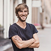 Smiling Man with Crossed Arms