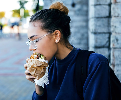 Girl Eating Hamburger_edited.jpg