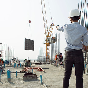 two-engineers-work-construction-site.jpg