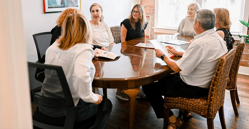 The Real t Simplistic Senior Move Management Team having a meeting..jpg