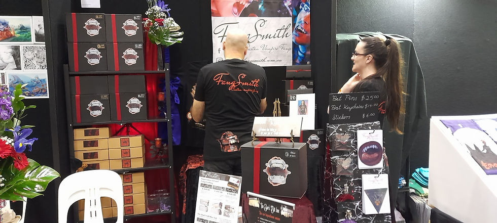 FangSmith custom vampire fangs planning the artist alley table layout at Supanova Perth 2023