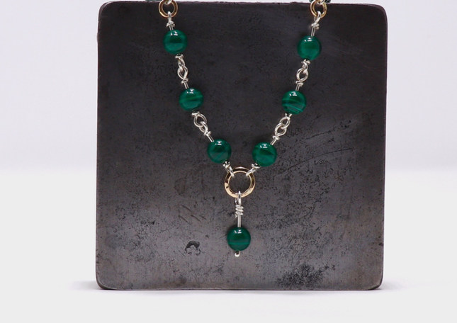 Handmade Malachite and silver necklace,  good luck travel charm available to order from Sarah Weatherall jewellery in Uckfield East Sussex
