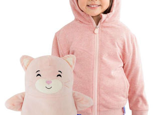 Girl wearing a pink cat Cubcoats hoodie standing next to the matching cat plush